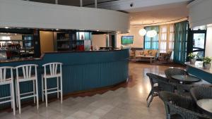 Lounge nebo bar v ubytování Abbázia Club Hotel Kék