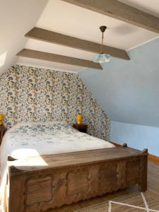 Postel nebo postele na pokoji v ubytování Gîtes l'appel de la Bretagne Gîte Bleuenn