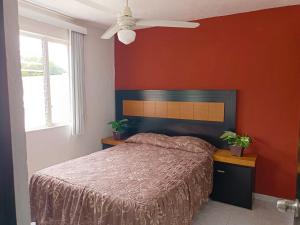 Katil atau katil-katil dalam bilik di Apartamento céntrico en Colima