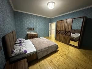 Ένα ή περισσότερα κρεβάτια σε δωμάτιο στο Family villa in Qabala +11 φωτογραφίες