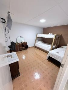 Postel nebo postele na pokoji v ubytování Casa hotel la 33