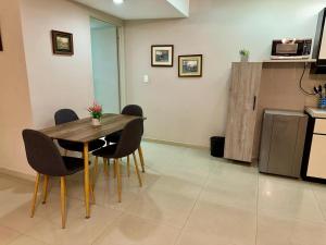 Eldhús eða eldhúskrókur á Apartaestudios - Torre de Cali