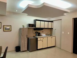 Eldhús eða eldhúskrókur á Apartaestudios - Torre de Cali