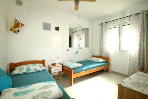 Postel nebo postele na pokoji v ubytování Villa Aurelia Vodice