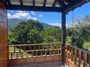 a balcony with a view of the mountains at chalet Relajante, En San Rafael in San Rafael