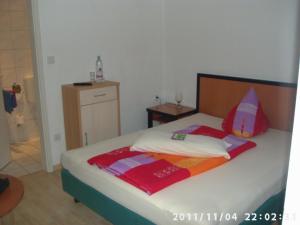 Postel nebo postele na pokoji v ubytování Zur Alten Fuldaschleife