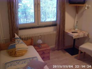 Postel nebo postele na pokoji v ubytování Zur Alten Fuldaschleife