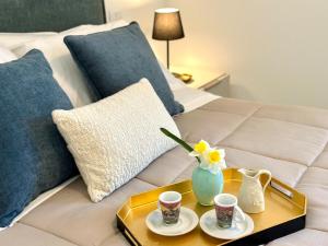 Ένα ή περισσότερα κρεβάτια σε δωμάτιο στο Perugia and Assisi Art Culture and Spirituality