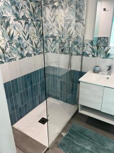 a bathroom with a shower and a sink at Aria di Mare in Lido di Ostia +43 photos