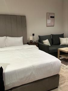 Ένα ή περισσότερα κρεβάτια σε δωμάτιο στο Great hosting studio