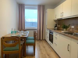 Kuchyň nebo kuchyňský kout v ubytování Hotel Haus Eggewald