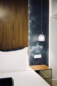 Hvar Riva Rooms客房内的一张或多张床位