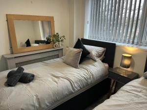 Katil atau katil-katil dalam bilik di Modern flat-apartment in Marton