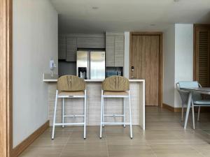 Η κουζίνα ή μικρή κουζίνα στο Modern apartment - Ocean view