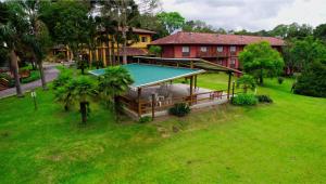 an overhead view of a house with a roof at Hotel Villa Passaredo in Tijucas do Sul