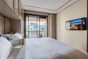 Postel nebo postele na pokoji v ubytování شقة فاخرة - Luxury apartment