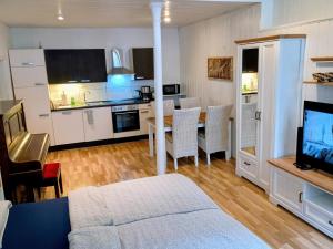 Kuchyň nebo kuchyňský kout v ubytování Damm 10 Appartement