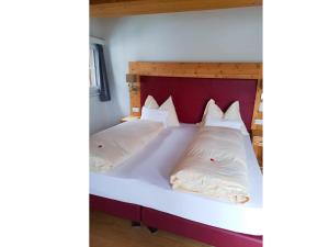 Voodi või voodid majutusasutuse Hotel Conrad toas