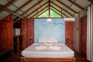Postel nebo postele na pokoji v ubytování Kaala Kalaththewa Luxury Eco Resort
