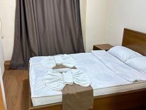 Postel nebo postele na pokoji v ubytování HOTEL IMERETI TBILISi
