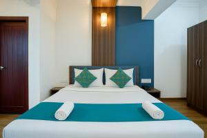 Voodi või voodid majutusasutuse Resort Three Story Baga GOA toas