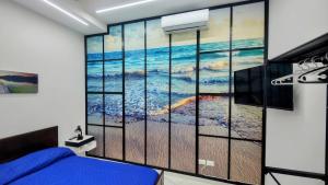 Ένα ή περισσότερα κρεβάτια σε δωμάτιο στο Roccaforte House - Palermo