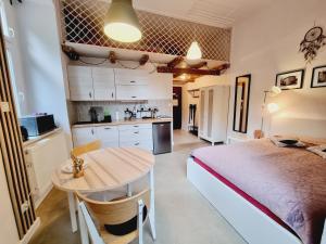 Posteľ alebo postele v izbe v ubytovaní Stara Poczta Apartament