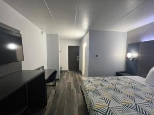 Postel nebo postele na pokoji v ubytování Motel 6 Chicago, IL - Halsted