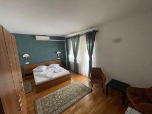 Postel nebo postele na pokoji v ubytování Casa Teodora