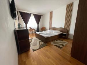 Postel nebo postele na pokoji v ubytování Casa Teodora
