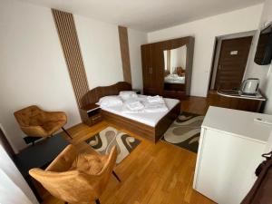 Postel nebo postele na pokoji v ubytování Casa Teodora