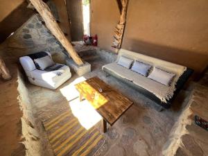 Posezení v ubytování Cabaña con piscina privada