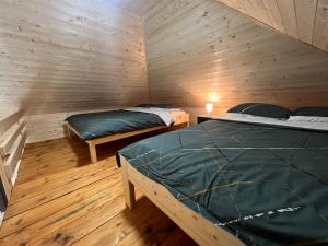 Postel nebo postele na pokoji v ubytování Etno selo EKO POGLEDI + 37 fotografií