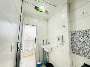 Koupelna v ubytování Refúgio Beira Mar Praia Grande + 10 fotografií