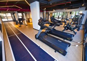 Fitness centrum a/nebo fitness zařízení v ubytování Urbà Home Stay by Housi