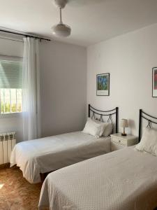 A bed or beds in a room at Casa Ricarda Még 25 kép