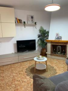 A television and/or entertainment centre at Casa Ricarda