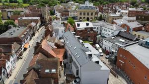 an aerial view of a town with buildings at Luxury 1 bed - 7 Queen Street Abingdon - Centrally located parking subject to availability in Abingdon +10 photos
