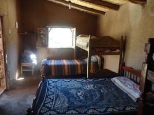 Krevet ili kreveti u jedinici u objektu Casa de Campo Clarita y Hector