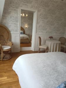 Postel nebo postele na pokoji v ubytování Manoir de Camblain