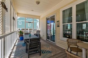 En balkon eller terrasse på Island Breeze