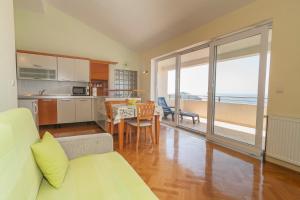 Kuchyň nebo kuchyňský kout v ubytování Apartments Simic