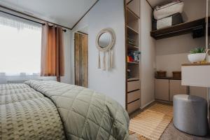 Postel nebo postele na pokoji v ubytování Tequila Sunrise - Ryde