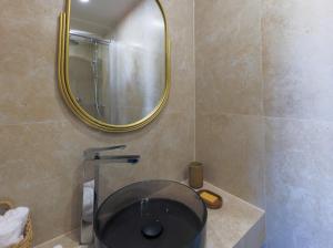 Koupelna v ubytování Hôtel Lou Juan