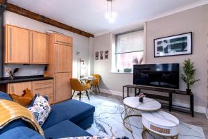 Μια τηλεόραση ή/και κέντρο ψυχαγωγίας στο Central 1-Bed Near The Station - Private Parking - Fast Wifi