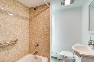 a bathroom with a sink and a toilet at Ski, Hike and Fish Pet-Friendly Home in Saylorsburg in Saylorsburg +17 photos