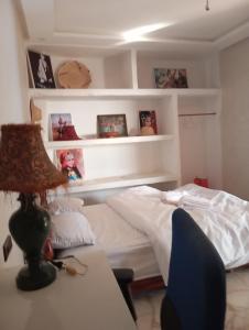 Postel nebo postele na pokoji v ubytování apartement 1 bif house taghazout tachdirt