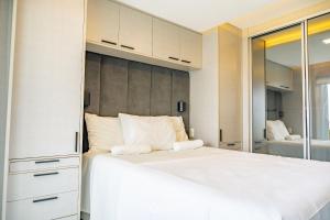 Postel nebo postele na pokoji v ubytování Duplex no In Mare Bali by Qavi + 27 fotografií