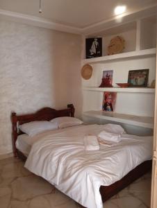 Postel nebo postele na pokoji v ubytování apartement 1 bif house taghazout tachdirt