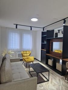 Η κουζίνα ή μικρή κουζίνα στο A&A Comfort Apartments